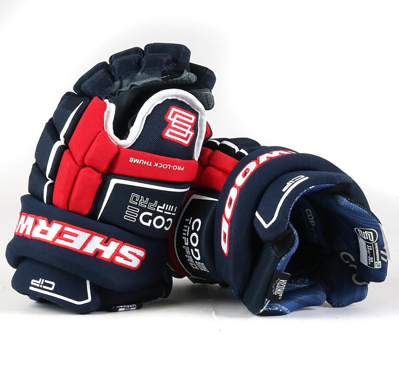 Gant de hockey junior Sherwood Code TMP Pro (bleu marine/rouge/blanc)